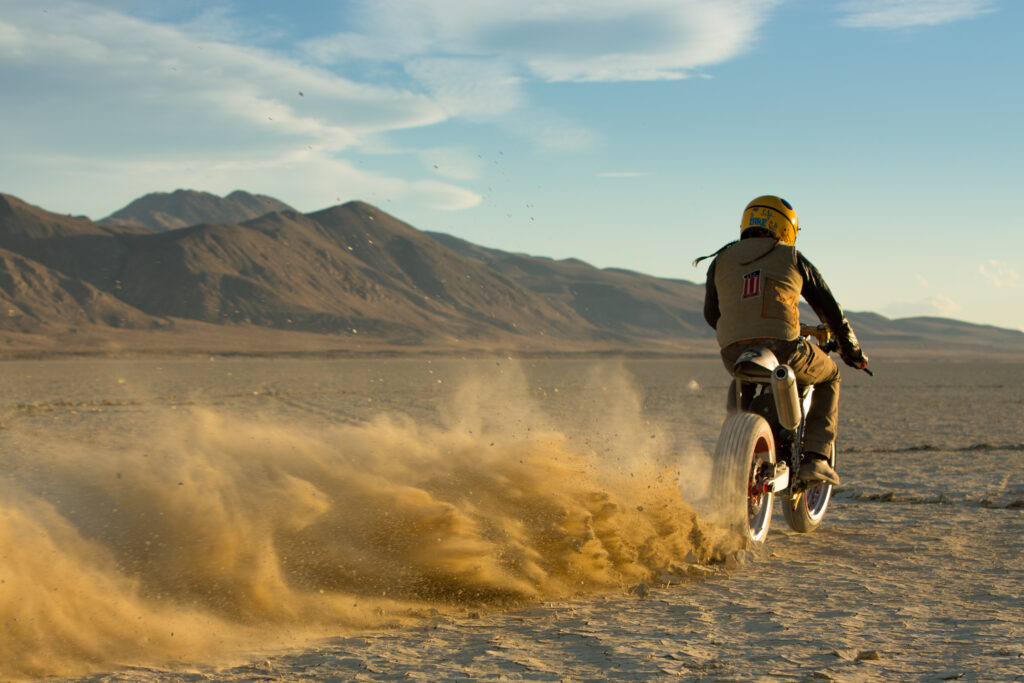 Drake McElroy gives full trottle on his custom Honda Coffee Race in the Black Rock Desert Nevada - Red Bull MotoSoul
